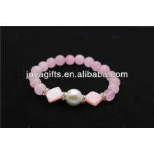 Piedras preciosas de cuarzo rosa con pulsera hecha a mano perla